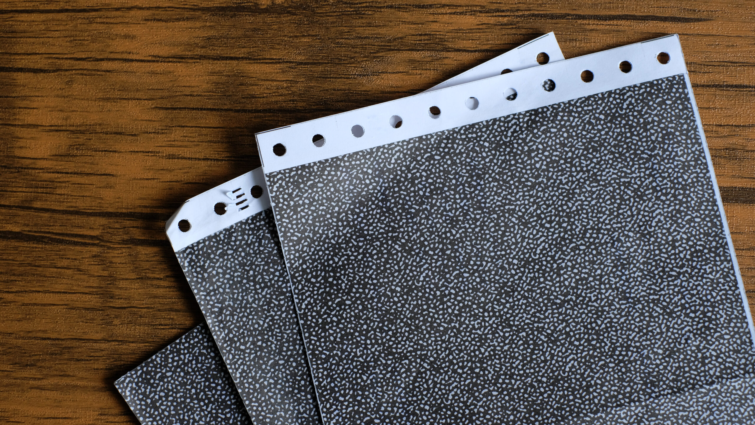 The,Carbon,Payslips,On,Wood,Background.,Salary,Payroll,Slip.soft,Focus.